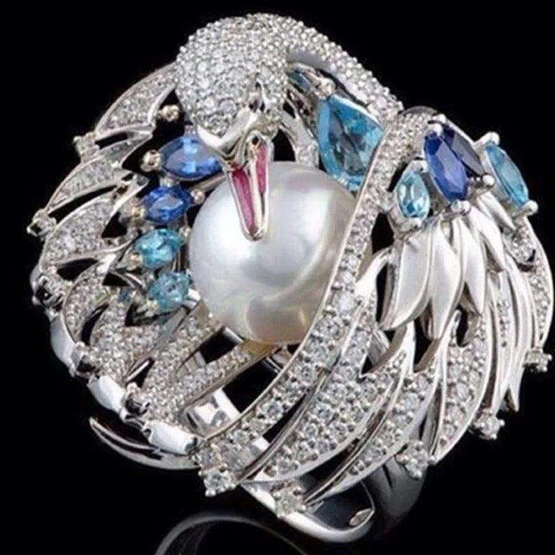 Nestled Pearl Swan Ring