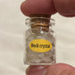 Natural Healing Crystals in Apothecary Bottle