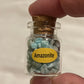 Natural Healing Crystals in Apothecary Bottle