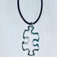 Floating Puzzle Piece Pendant