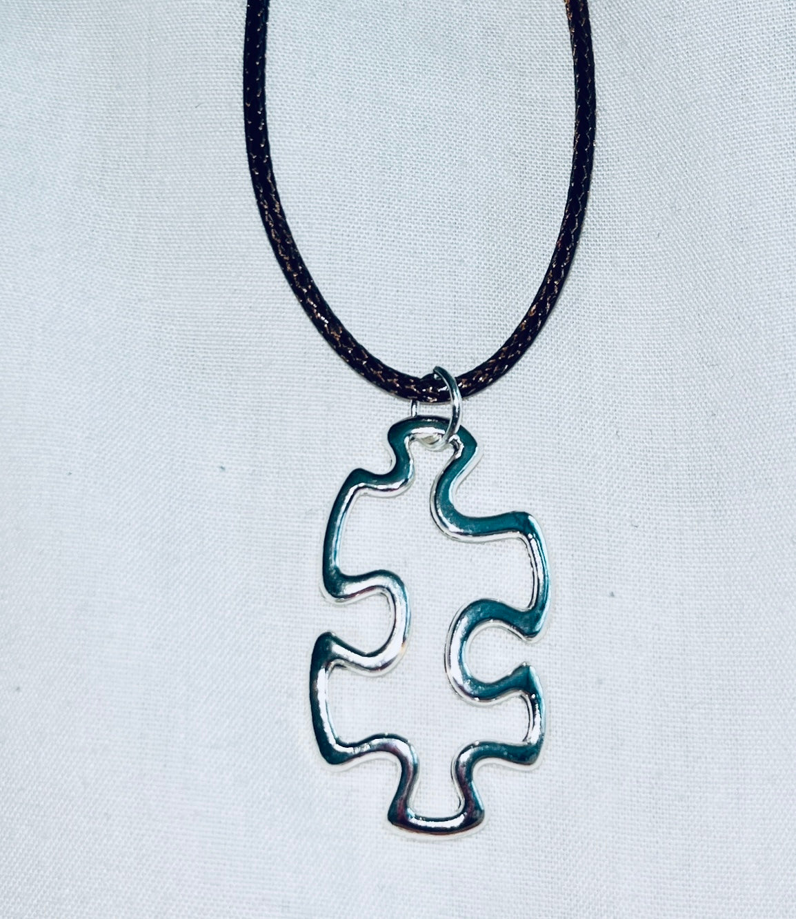 Floating Puzzle Piece Pendant