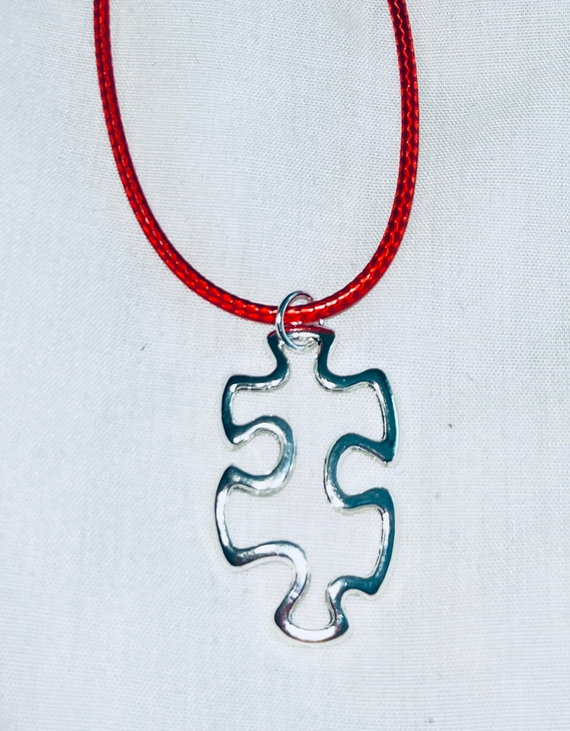 Floating Puzzle Piece Pendant