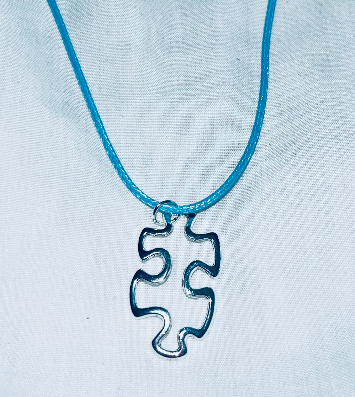 Floating Puzzle Piece Pendant