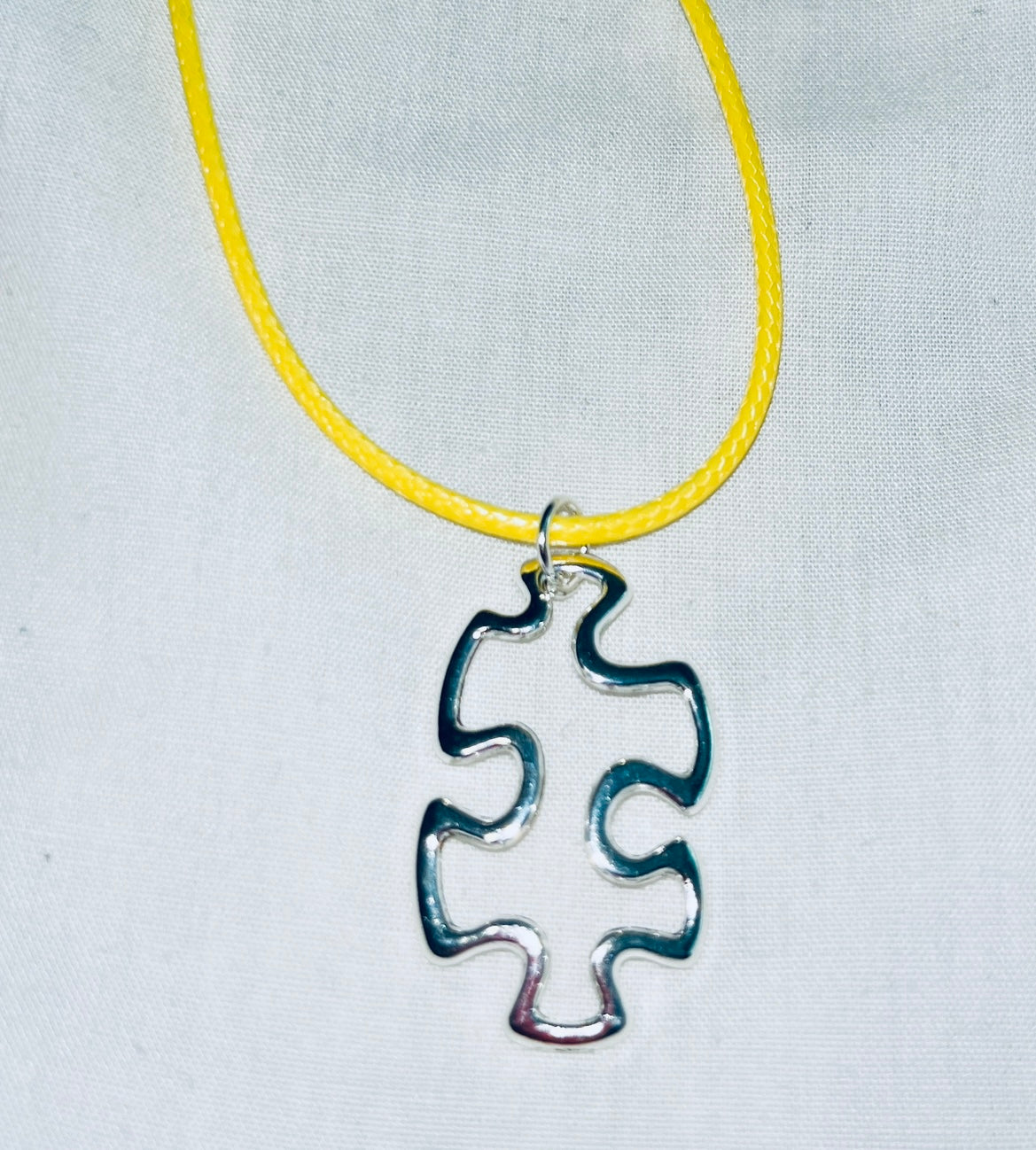 Floating Puzzle Piece Pendant