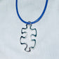Floating Puzzle Piece Pendant
