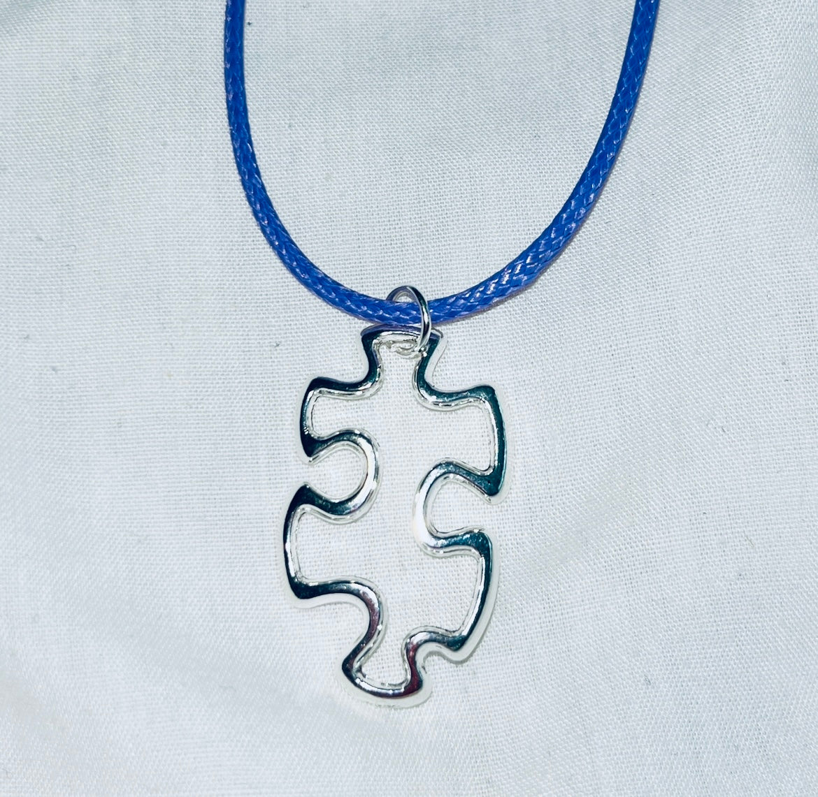 Floating Puzzle Piece Pendant